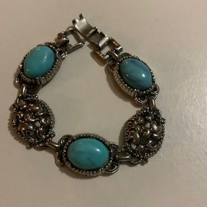 Silver and turquoise bracelet.